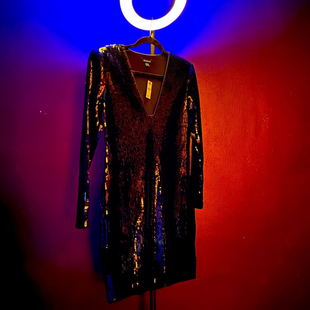 Sequin mini dress with strong shoulders